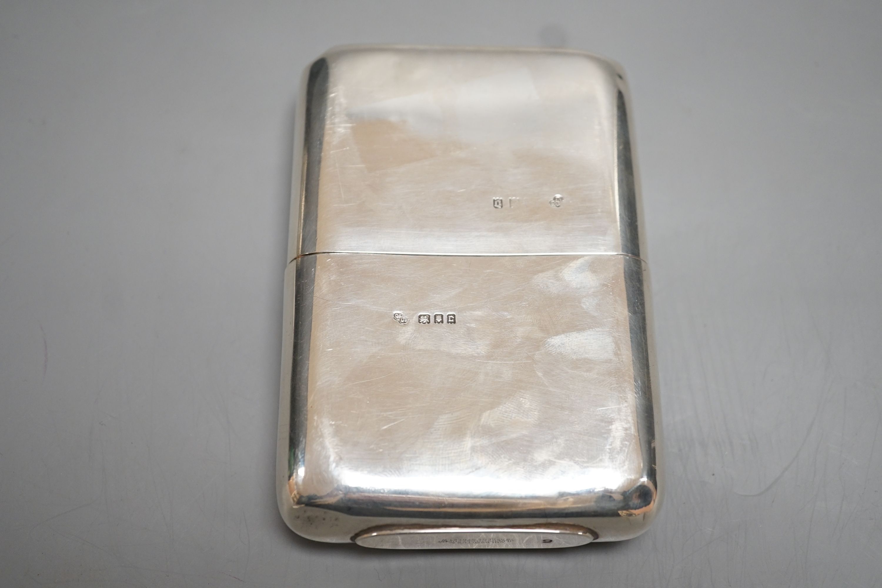 A George V silver hip flask, by Goldsmiths & Silversmiths Co Ltd, London, 1918/19, 13cm, 9oz.